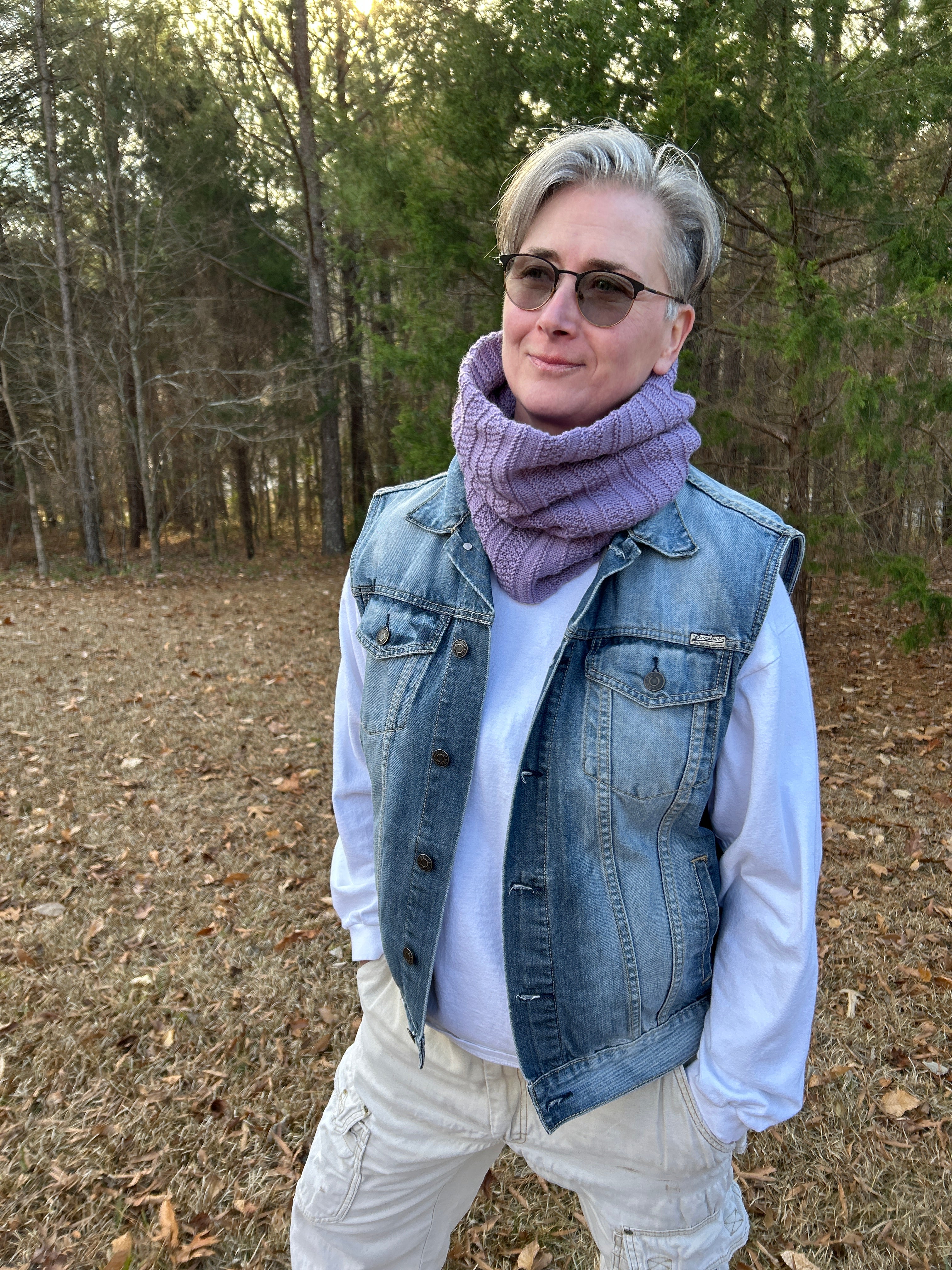 Dyer Sheri Osborne modeling this lavender colored cowl  with a jean vest and khaki pants.
